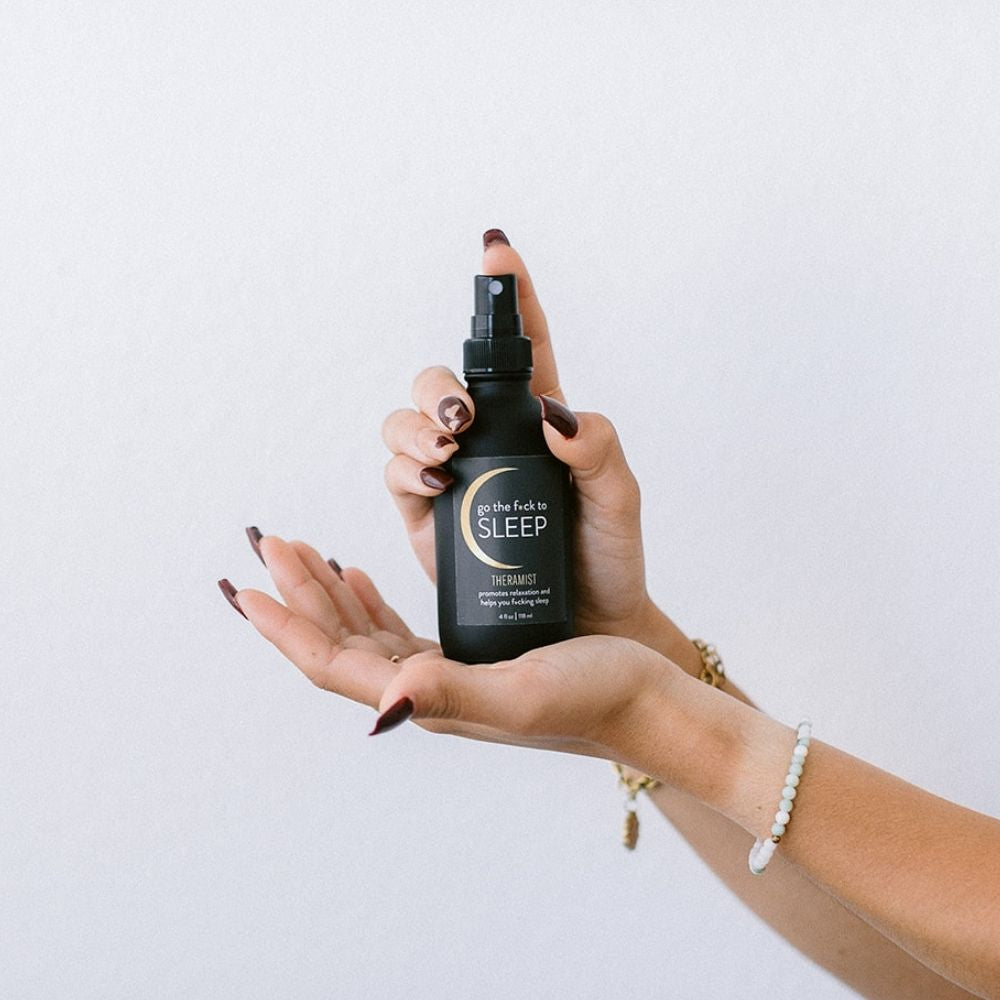 Go The F*ck To Sleep therapeutic mist is made with organic lavender and lemon essential oils, calming Flower Essences, and water.  It promotes relaxation and helps you f*cking sleep.  Spray it in your bedroom, on yourself, or on your linens before bed.  Shake well, spritz, and get some f*cking